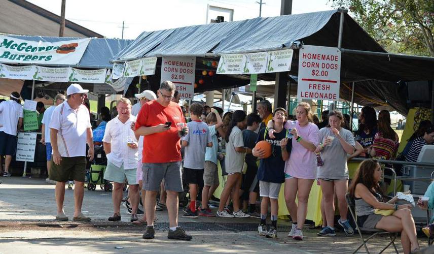 Flying horses, sliding dads, rolling dragons at St. Fair