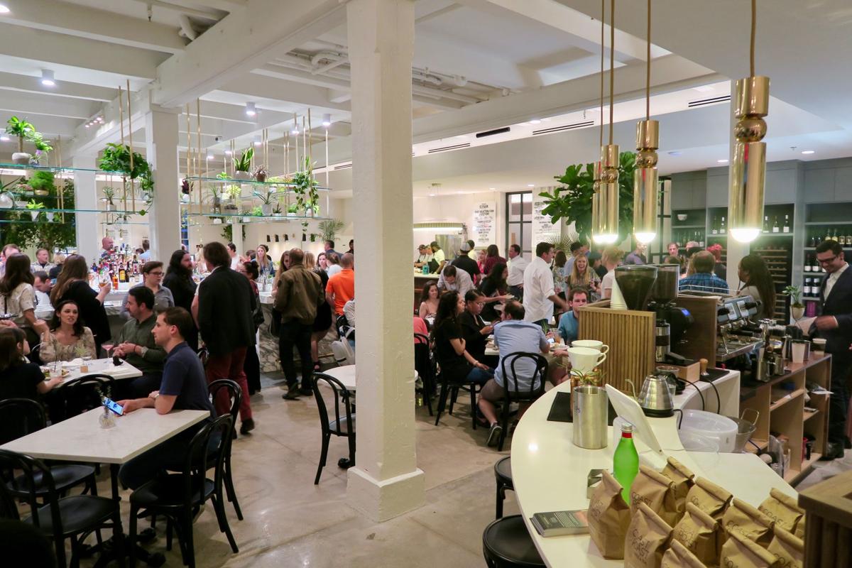 Warehouse District Food Hall Auction House Market Opens With Flavors The Food Hall Auction House Market Has A Range Of Flavors And Central Bar In Warehouse District New Orleans