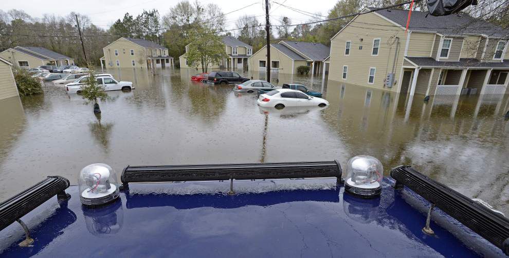 Louisiana in struggle vs. nature as rivers flood, break 1983 records