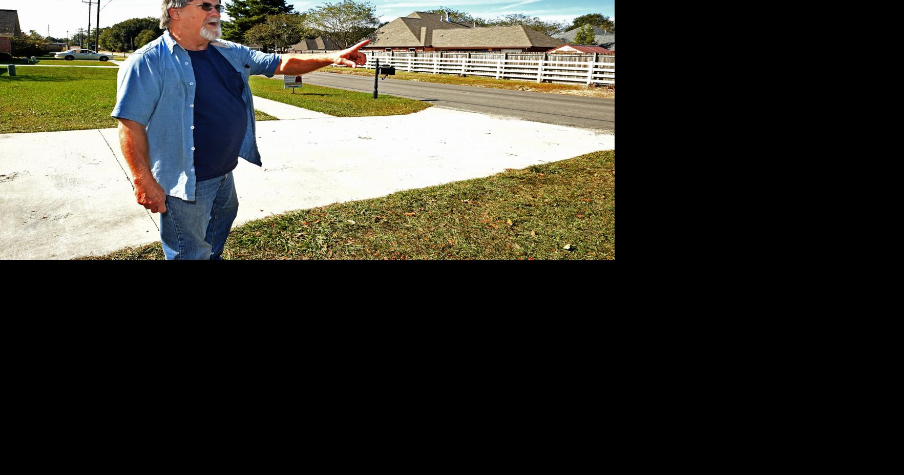 Denham Springs residents suing parish, drainage district over August