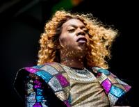 Watch Big Freedia and Lizzo take over a bingo hall and the beach in "Karaoke" music video