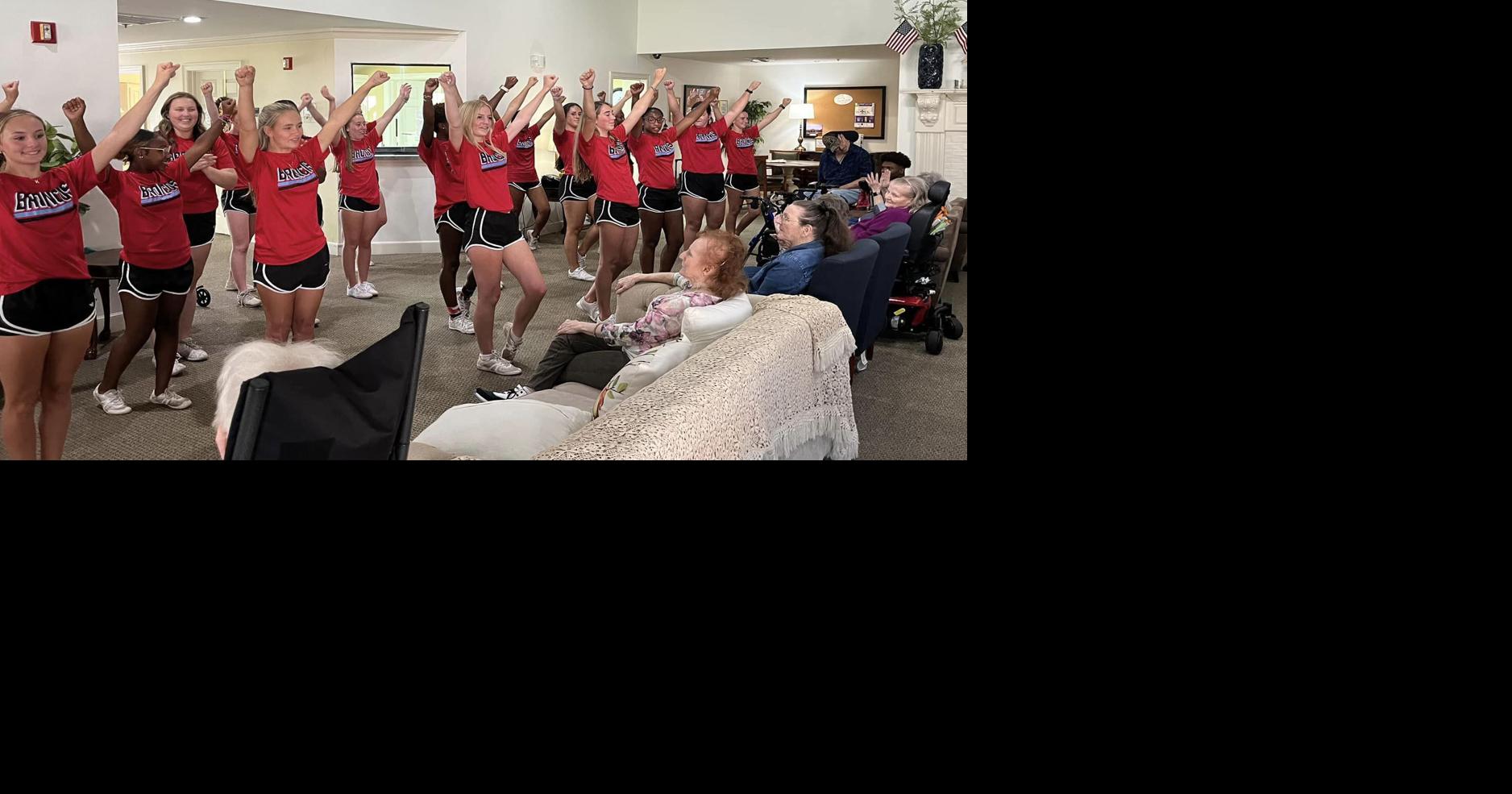 Zachary High cheerleaders perform at Oakwood Village Zachary