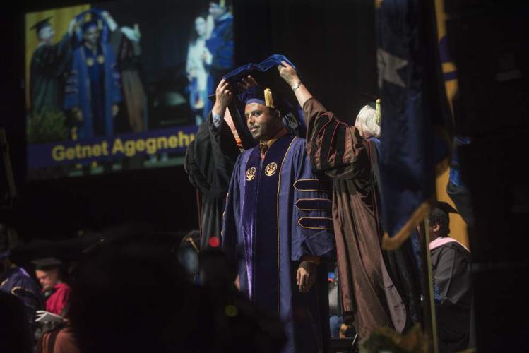 Photos Summer heat doesn't stop these LSU graduates from donning their