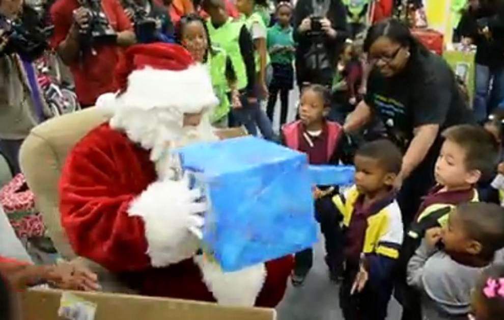 BRPD, Santa deliver toys to Audubon Elementary students _lowres