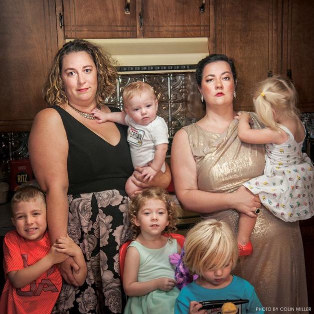 Cross Culture Two women behind 'Cajun Face' back to perform 'Cajun