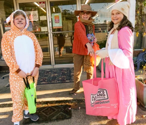 Costumed residents take to the streets of St. Francisville St