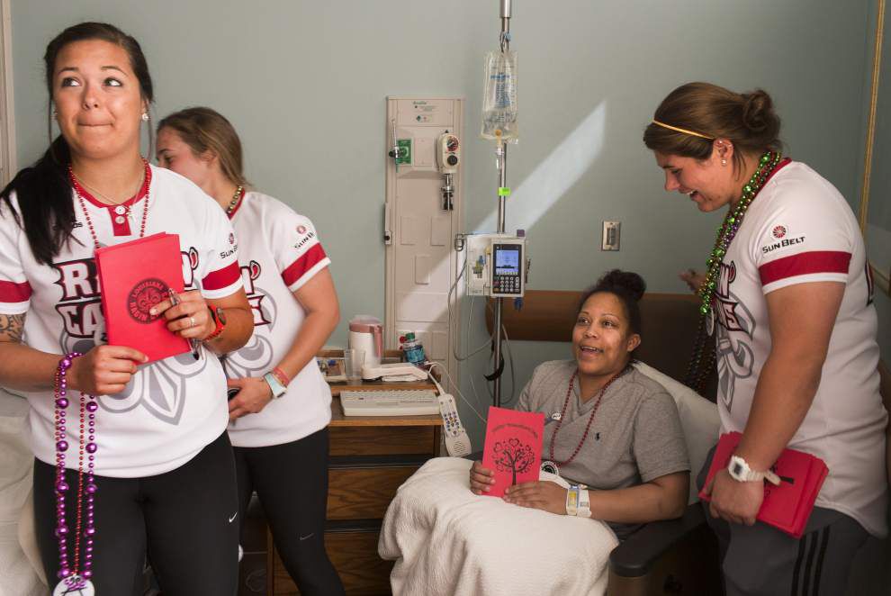 Photos: Lady Cajuns deliver Valentine at Lourdes _lowres