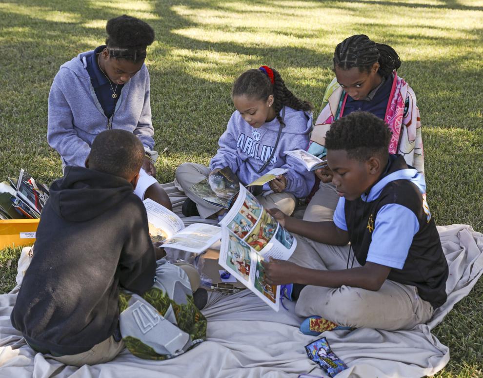 Photos Westdale Middle School hosts "Literacy on the Lawn" Baton
