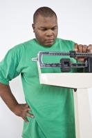 Man using weight scales