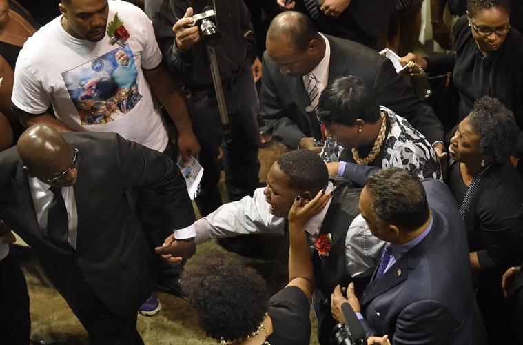 Photos: At Alton Sterling funeral services, tears, hugs among crowd of