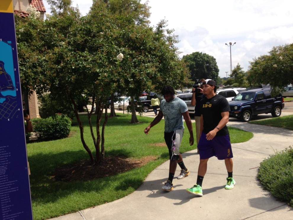 LSU football players report to fall camp _lowres