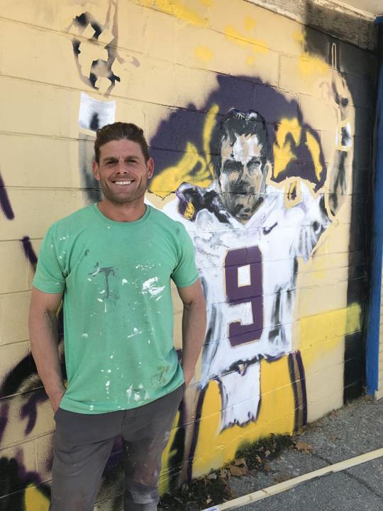 Yes, that's Joe Burrow in that Baton Rouge mural; he'll soon be joined