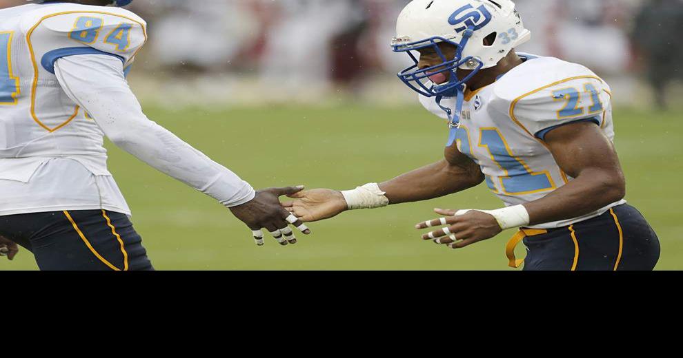 Photos: Southern sloshes its way to messy, but important, win at Texas ...