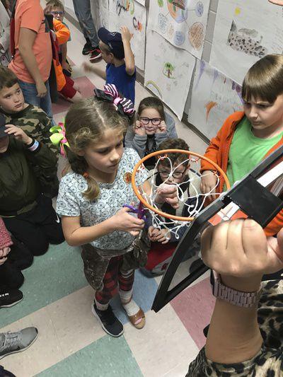 Students 'cut net' to encourage growth