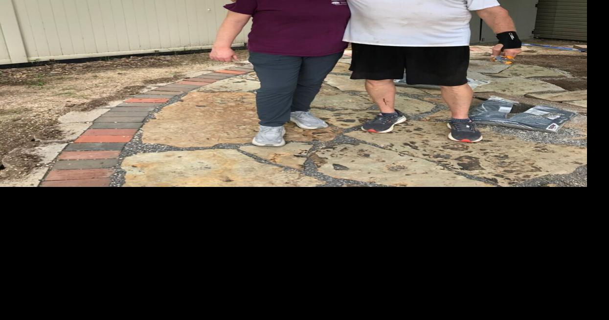 Master Gardener finishes patio for homeless shelter backyard