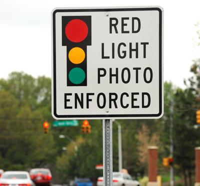 FILE - Red Light Photo Enforced Camera
