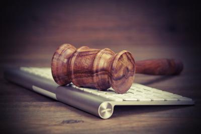 FILE - Court Law Litigation Lawsuit Email Computer Access Internet Bid Auction