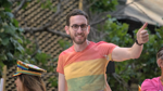 Scott Wiener gives thumbs up at San Francisco Pride Parade.