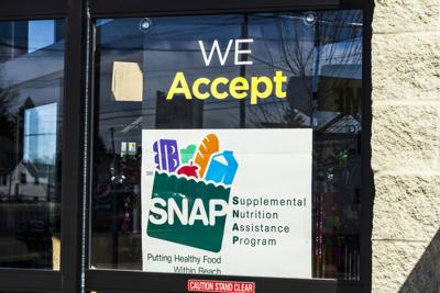 FILE - Food Stamps, Snap, Store