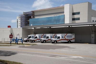 FILE - ambulances, hospital