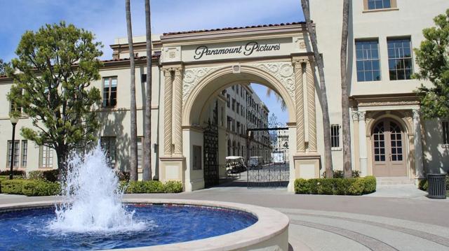 April trial date sought in suit against Paramount, Warner Bros.