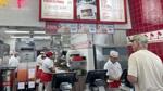 In-N-Out employees serve customers at lunchtime near Los Angeles