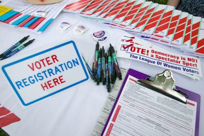 FILE - Voter registration