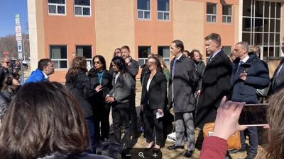 Crowd gathers outside courthouse during Greenpeace liability verdict