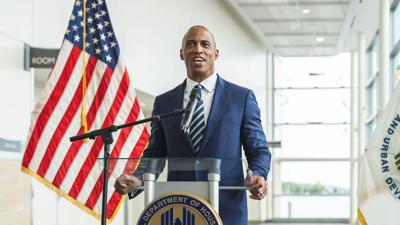 Scott Turner speaks at a podium in Erie, Pennsylvania in 2025.