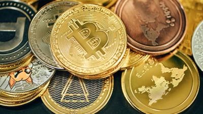 https://unsplash.com/photos/a-pile-of-gold-and-silver-bitcoins-kM6QNrgo0YE