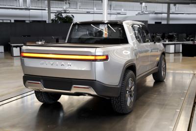 rivian electric truck trucks gm ford r1t lifted jump companies count ev company expected don sales thecentersquare mich plymouth headquarters