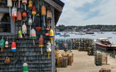 FILE - fishing seafood lobster dock wharf New England Maine traps fish shack