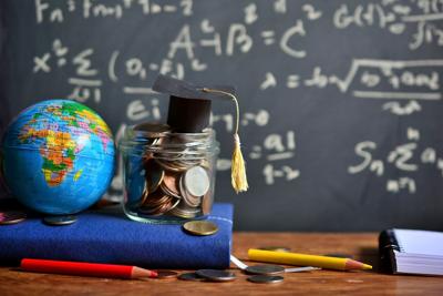 FILE - Education Finance Money Graduation Investment Cost