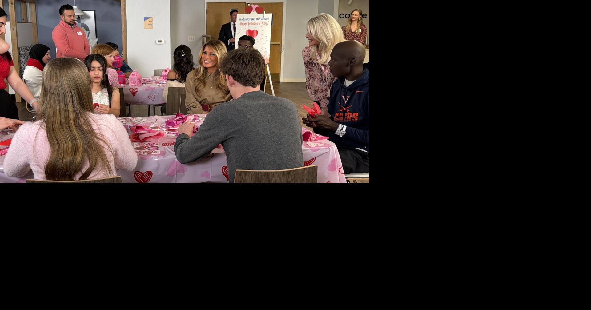 First lady charms young patients during NIH visit