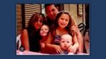 Jason David Cayne with his wife, Gina, and their three children.