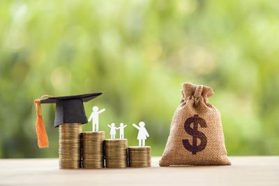FILE - education money funding federal school graduate financial