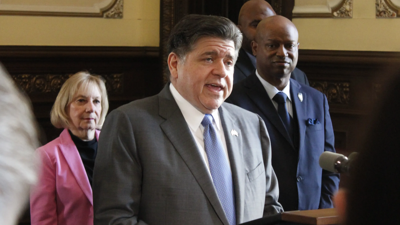 Illinois Gov. J.B. Pritzker speaks to reporters at the Illinois State Capitol about the state budget.