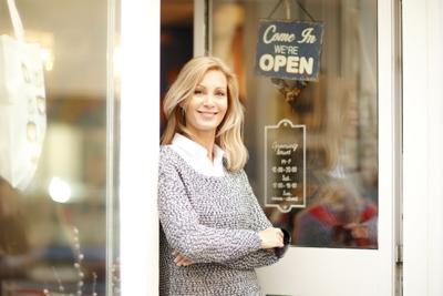 FILE - Shop Local Small Business Store Generic Come In We're Open