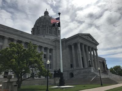 FILE - American flag over Missouri Capitol