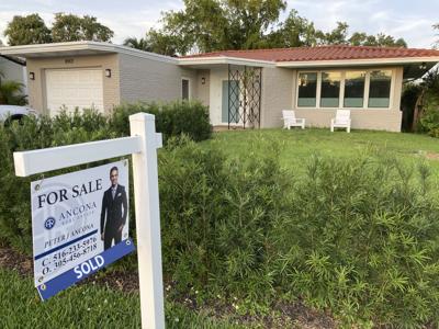 FILE - Florida house, sold, for sale, home sales, Mortgage Rates
