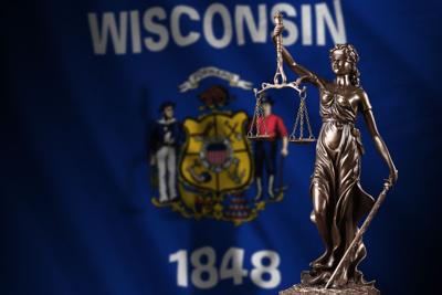 FILE - Wisconsin Law Judge Court Litigation Lady Justice Scales