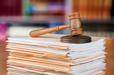 FILE - gavel, court, documents