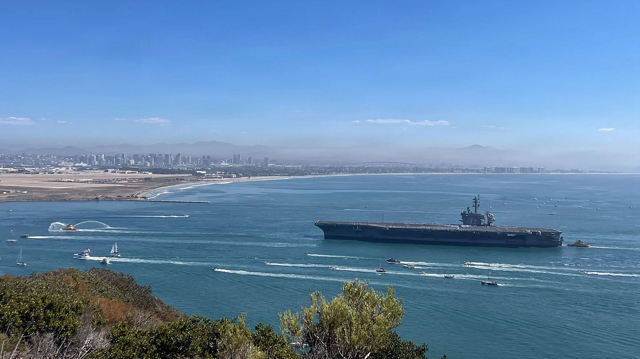 Aircraft carrier returns from Middle East to cheering crowd after 10 months at sea and 200 days in combat 