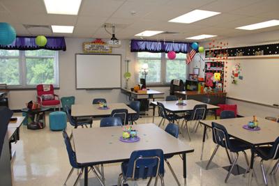 FILE - school classroom, teacher, education