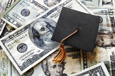 FILE - Graduation Debt Loan Student Money