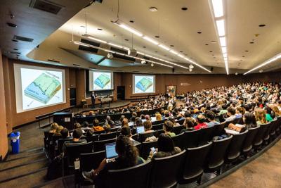 FILE - College lecture hall, professor, university, classroom