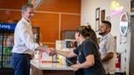 Gavin Newsom shakes hands with restaurant owner at Cuernavaca’s Grill in Bell, California.