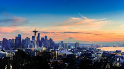 FILE – Sunset in Seattle