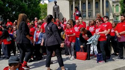 Chicago Teachers Union members gather at the Illinois State Capitol.
