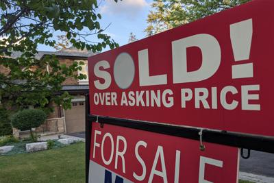 FILE - Housing Market For Sale Sign Over Asking Price Affordable Lease Mortgage Lender